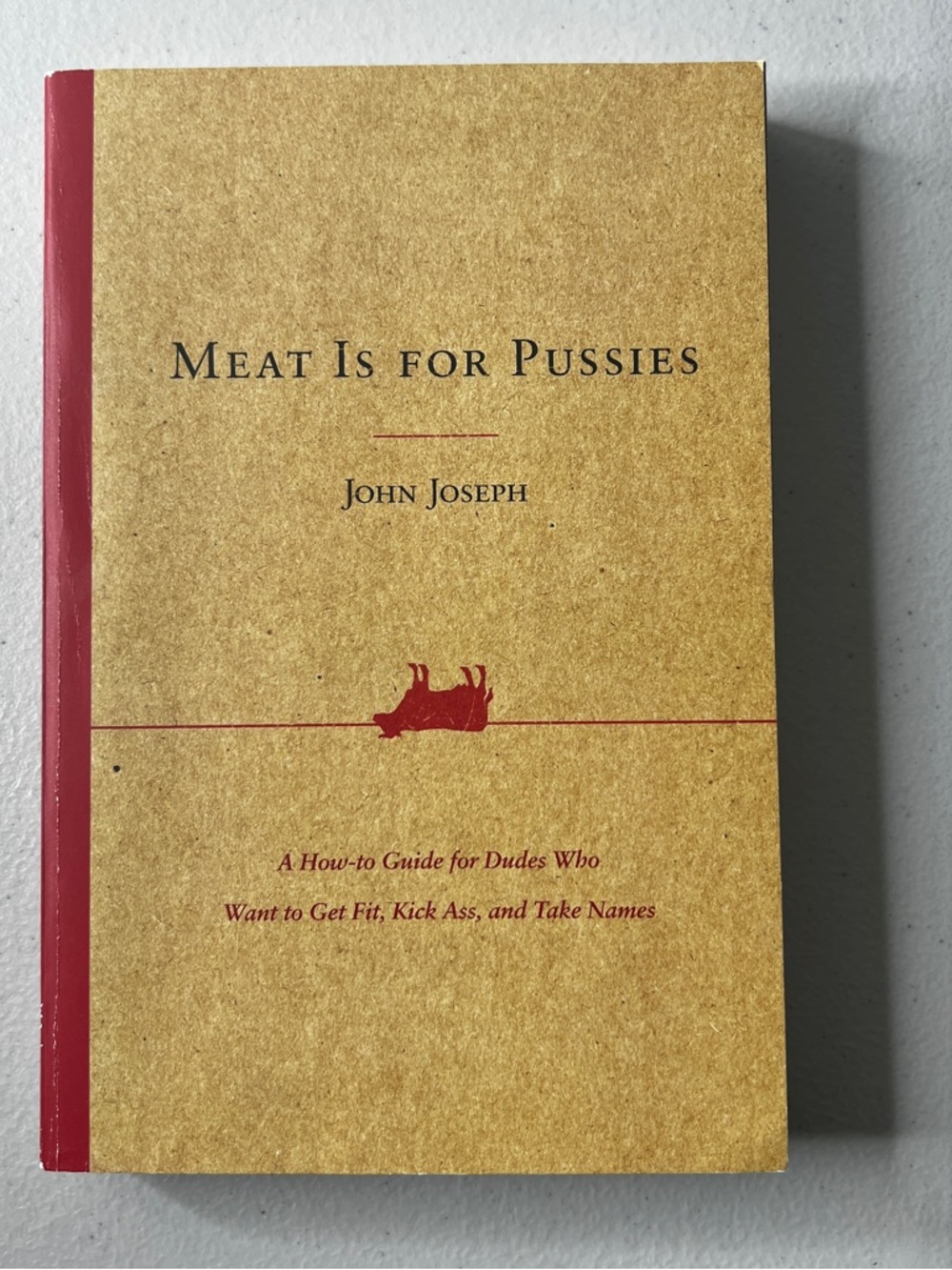 Meat Is for Pussies by John Joseph - Tan & Red Paperback